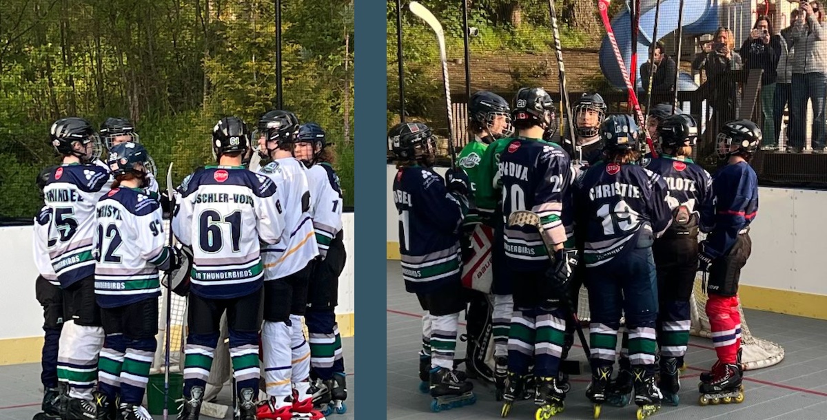Photo of the light team and dark team huddling before the game starts